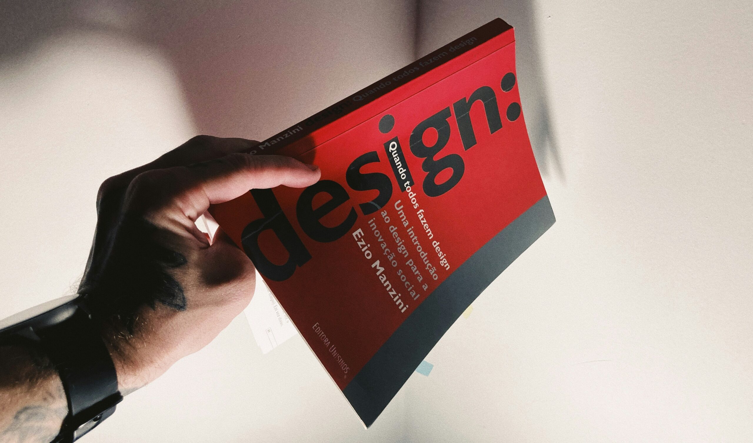 red book cover with the word design